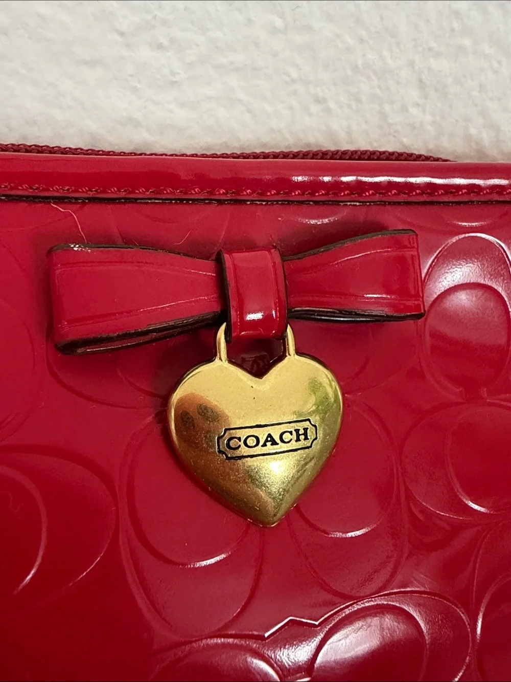 Coach glossy red